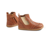 Pair of brown children's boots on a white background