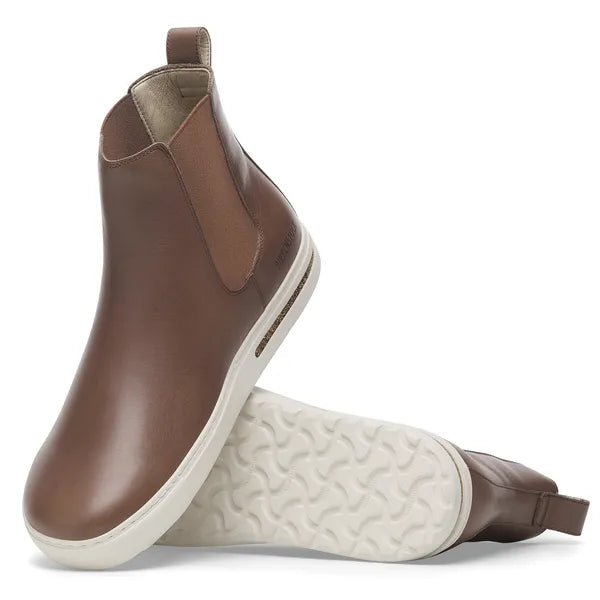 brown ankle boot with white sole